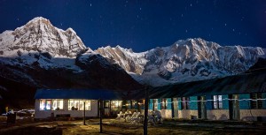 Moonlight strikes Annapurna I (on the right, 26,545 feet), the world's 10th highest peak, seen from Annapurna South Base Camp.